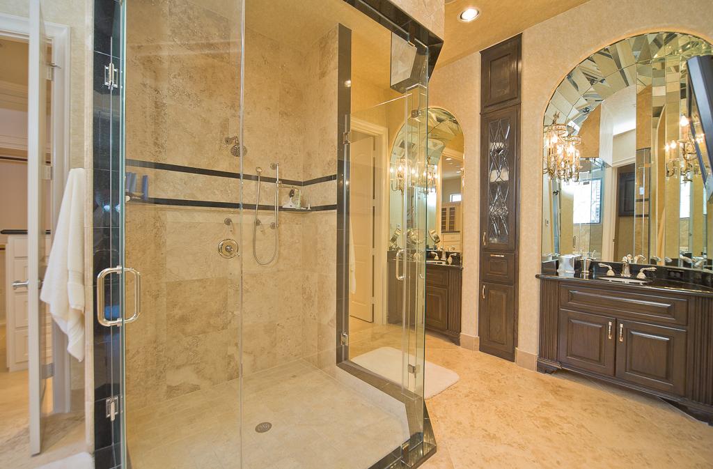265 Promenade Street South Montgomery, TX 77356 - Photo 28 of 45 a bathroom with a granite countertop shower mirror and a sink