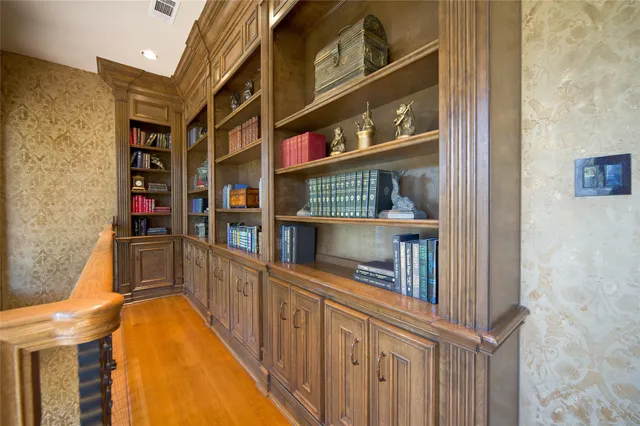 a view of a balcony and book shelf
