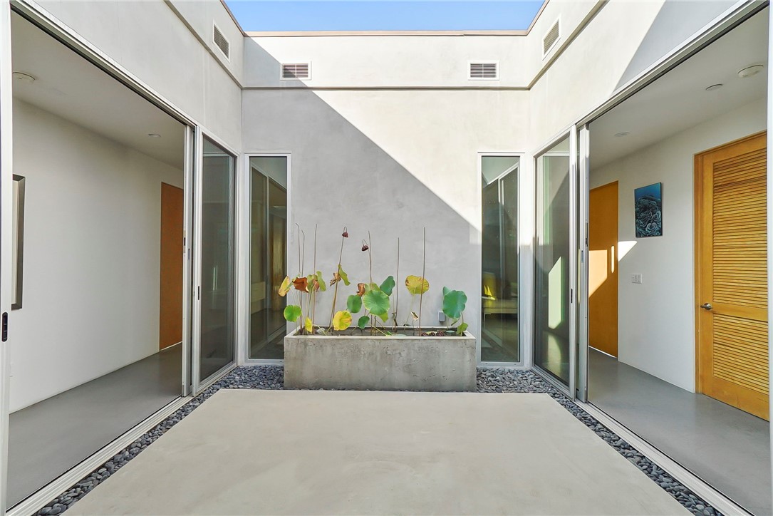 12066 Celine Street El Monte, CA 91732 - Photo 11 of 21 a balcony with glass door and glass door