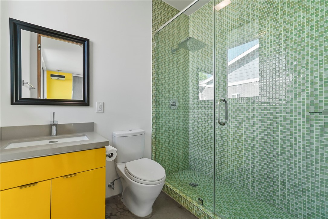 12066 Celine Street El Monte, CA 91732 - Photo 15 of 21 a bathroom with a granite countertop sink toilet and mirror