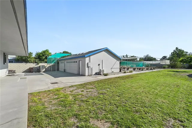 a house view with a garden space