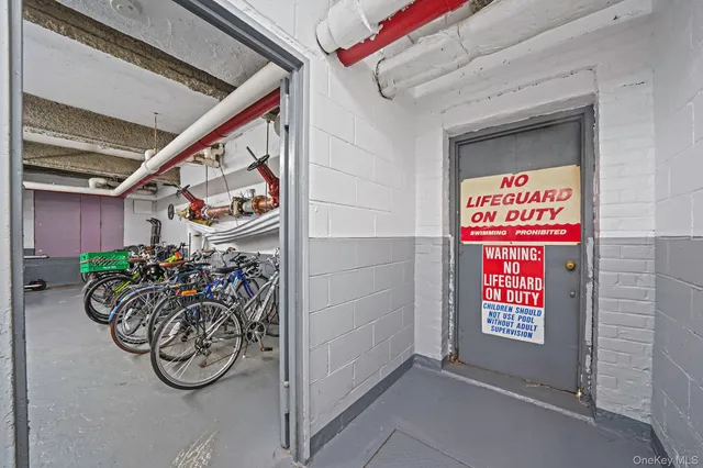 a view of water heater room with bicycles