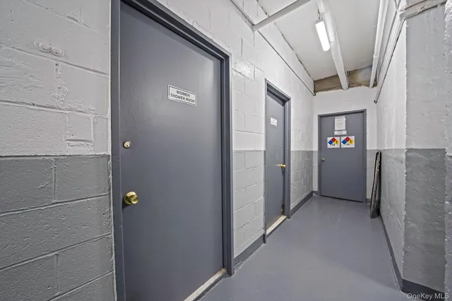 a view of a lobby with furniture and floor to ceiling window