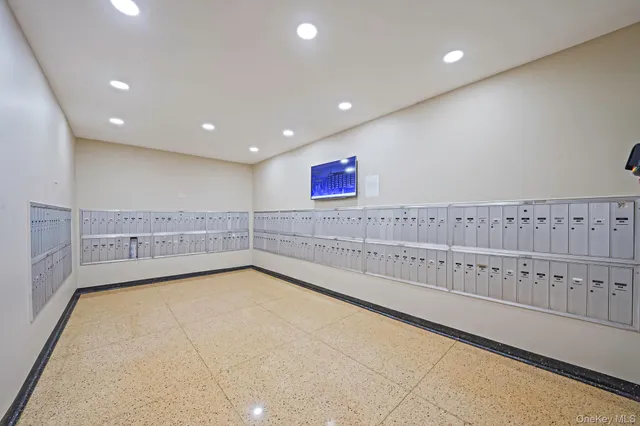 a view of parking garage with cars