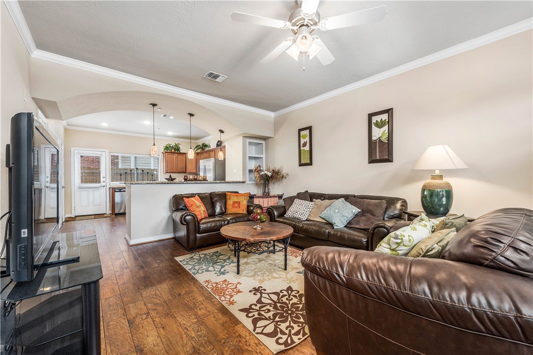 1198 Jones-Butler Road, Unit 1809 College Station, TX 77840 - Photo 3 of 14 a living room with furniture and a flat screen tv