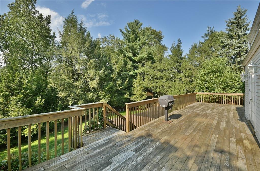 765 Pinoak Road Pittsburgh, PA 15243 - Photo 22 of 23 Expansive deck on back with three French doors leading into the home. Gas line goes to the grill making dinner time easy