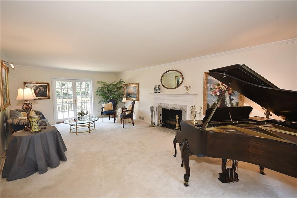 765 Pinoak Road Pittsburgh, PA 15243 - Photo 6 of 23 Living room with French doors leading to deck