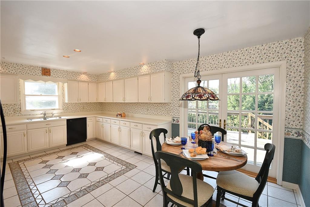 765 Pinoak Road Pittsburgh, PA 15243 - Photo 10 of 23 Light and bright large eat-in Kitchen with French doors leading to deck