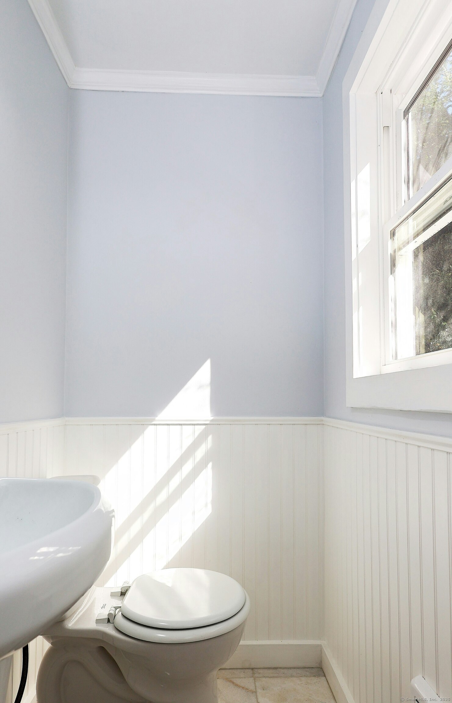 213 Mamanasco Road Ridgefield, CT 06877 - Photo 12 of 35 a bathroom with a toilet and a sink
