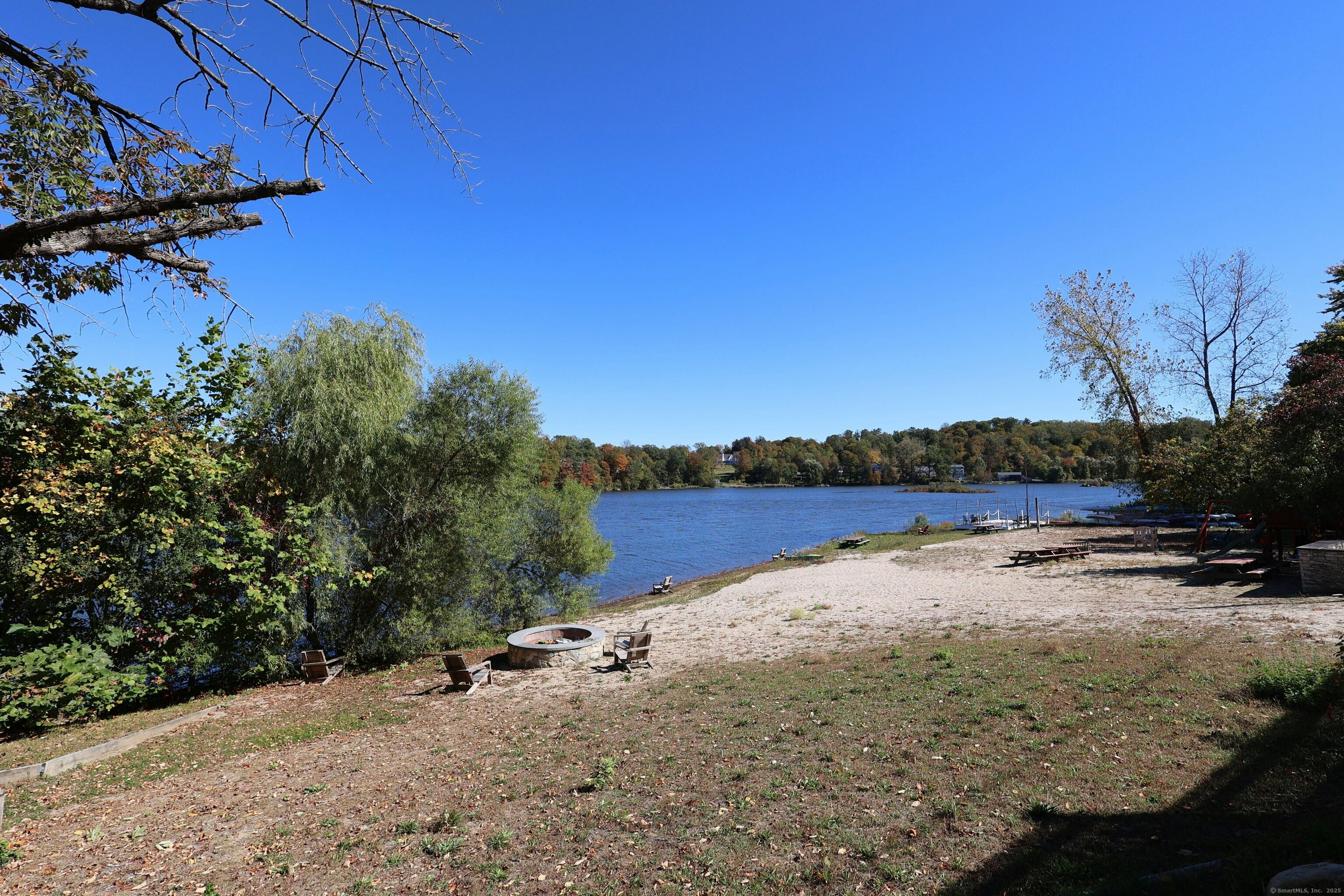 213 Mamanasco Road Ridgefield, CT 06877 - Photo 2 of 35 a view of lake with mountain