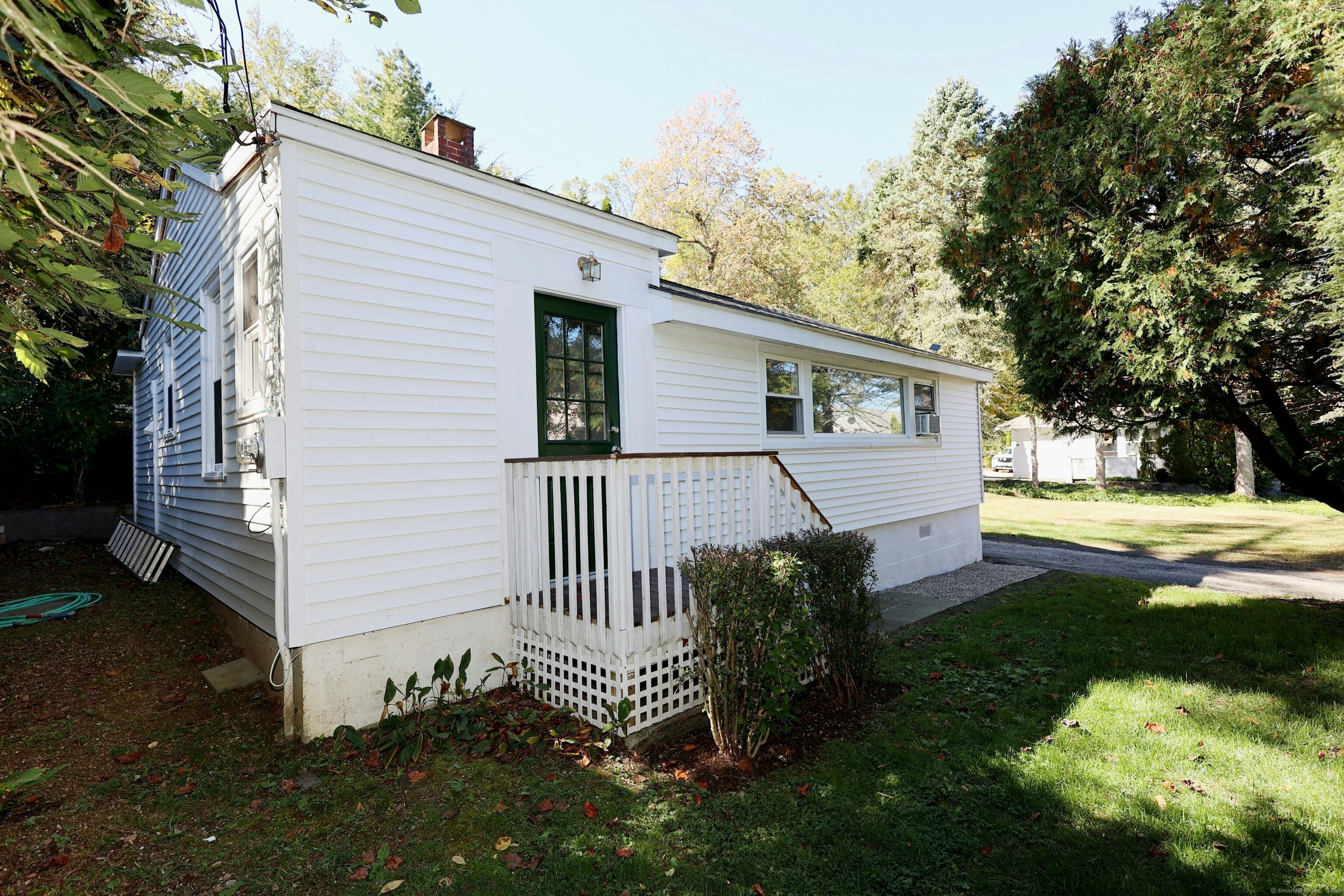 213 Mamanasco Road Ridgefield, CT 06877 - Photo 23 of 35 a view of backyard with a garden