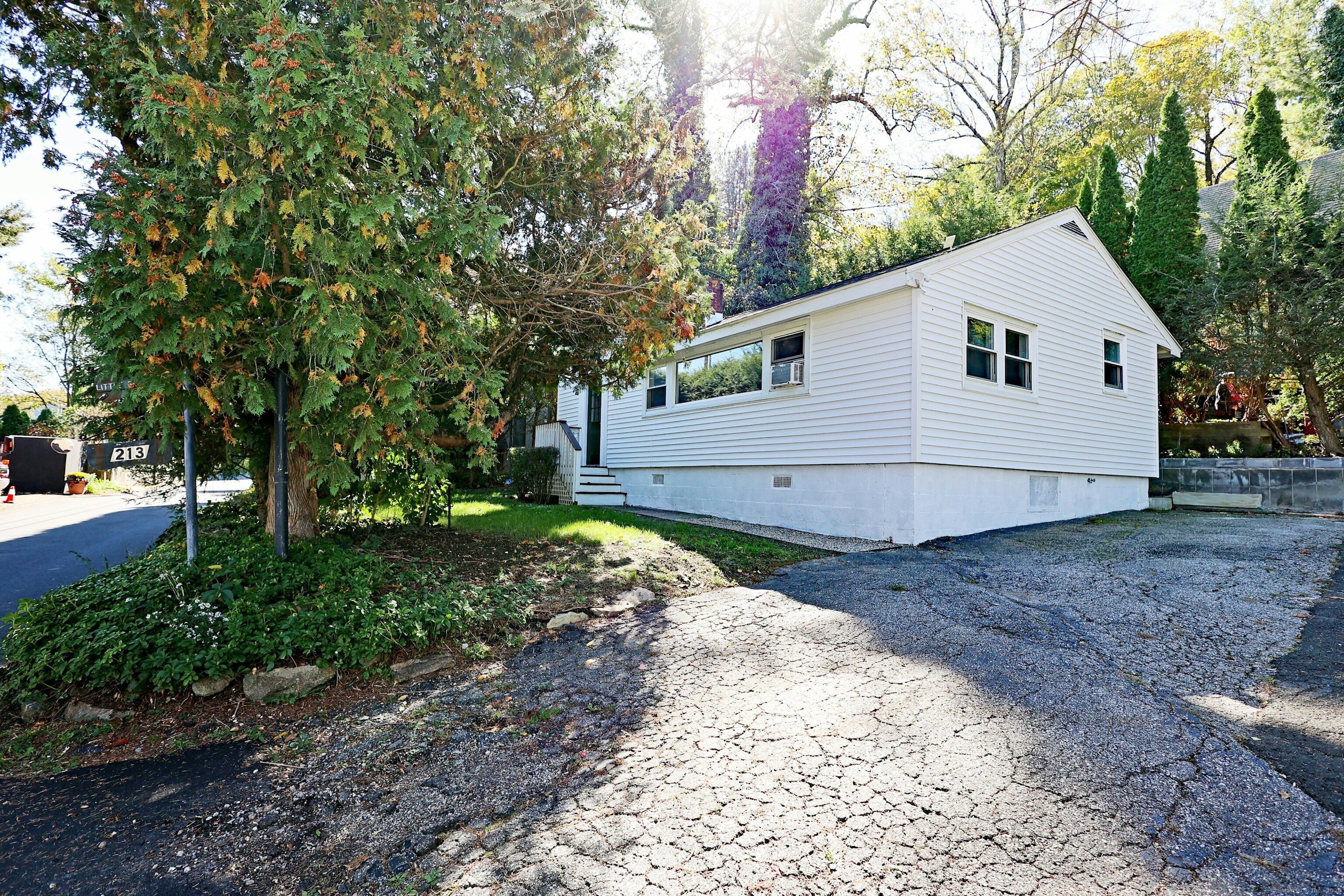 213 Mamanasco Road Ridgefield, CT 06877 - Photo 29 of 35 a view of a house with a yard