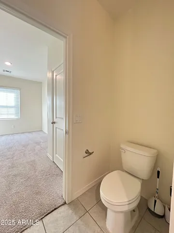 a white bath tub sitting in a bathroom