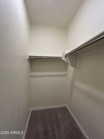 an empty room with an entryway