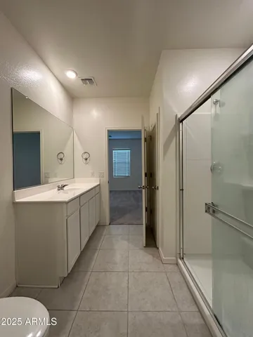 a view of backyard with large windows