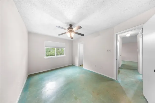 a view of a room with a fan