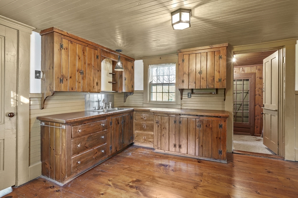 216 Brookfield Road Charlton, MA 01507 - Photo 13 of 42 a kitchen with stainless steel appliances granite countertop a stove a sink and a refrigerator