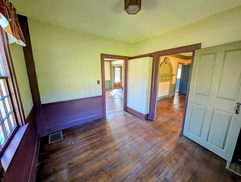 216 Brookfield Road Charlton, MA 01507 - Photo 15 of 42 a view of a hallway with wooden floor and closet