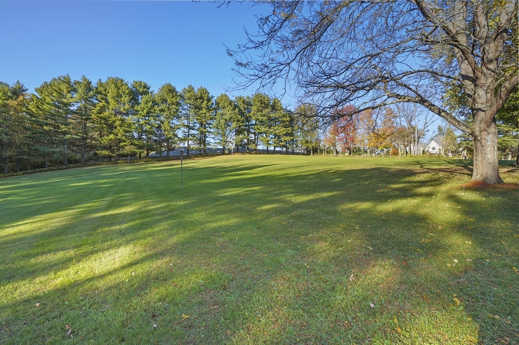 216 Brookfield Road Charlton, MA 01507 - Photo 2 of 42 a view of a golf course with a trees
