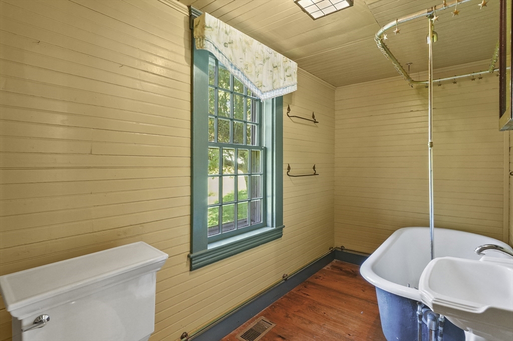 216 Brookfield Road Charlton, MA 01507 - Photo 35 of 42 a bathroom with a sink a toilet and shower