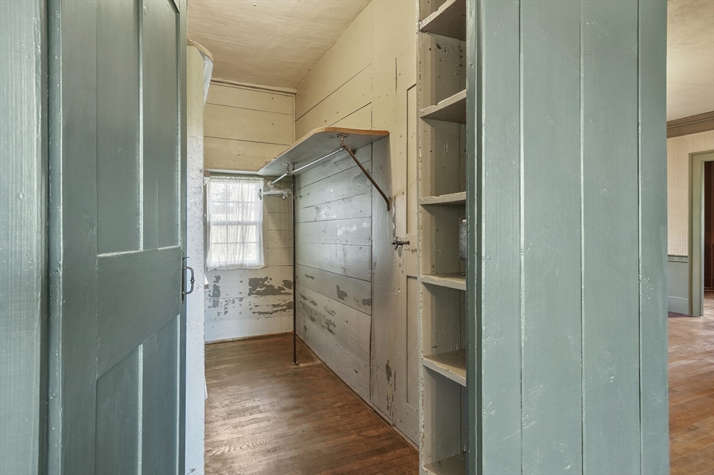 216 Brookfield Road Charlton, MA 01507 - Photo 41 of 42 a bathroom with a glass shower door
