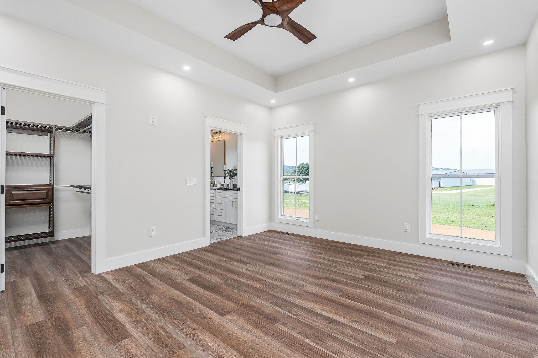 217 Oaklawn Cemetery Road Sparta, TN 38583 - Photo 18 of 42 a view of an empty room with window and wooden floor