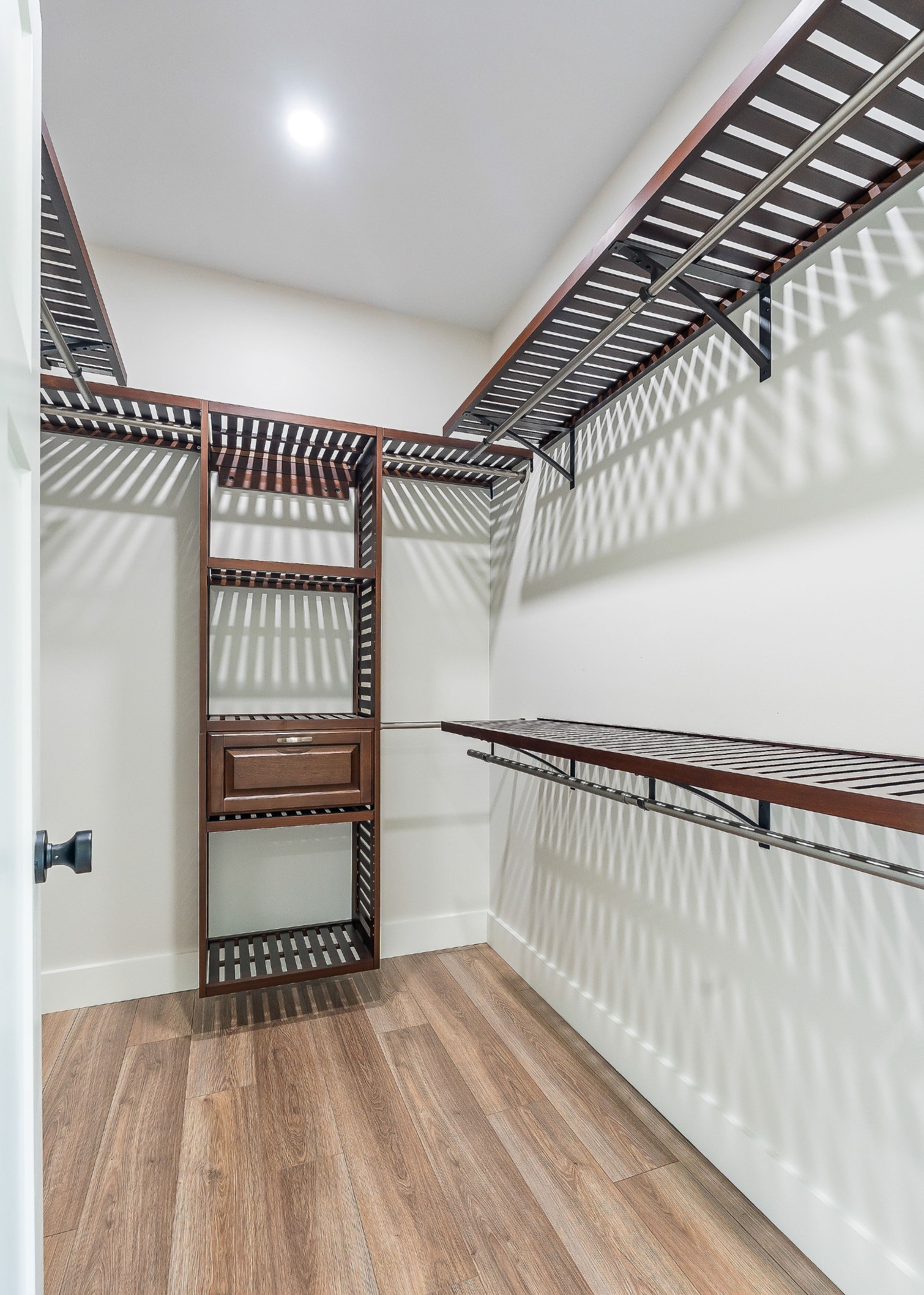 217 Oaklawn Cemetery Road Sparta, TN 38583 - Photo 19 of 42 a view of walk in closet with wooden floor