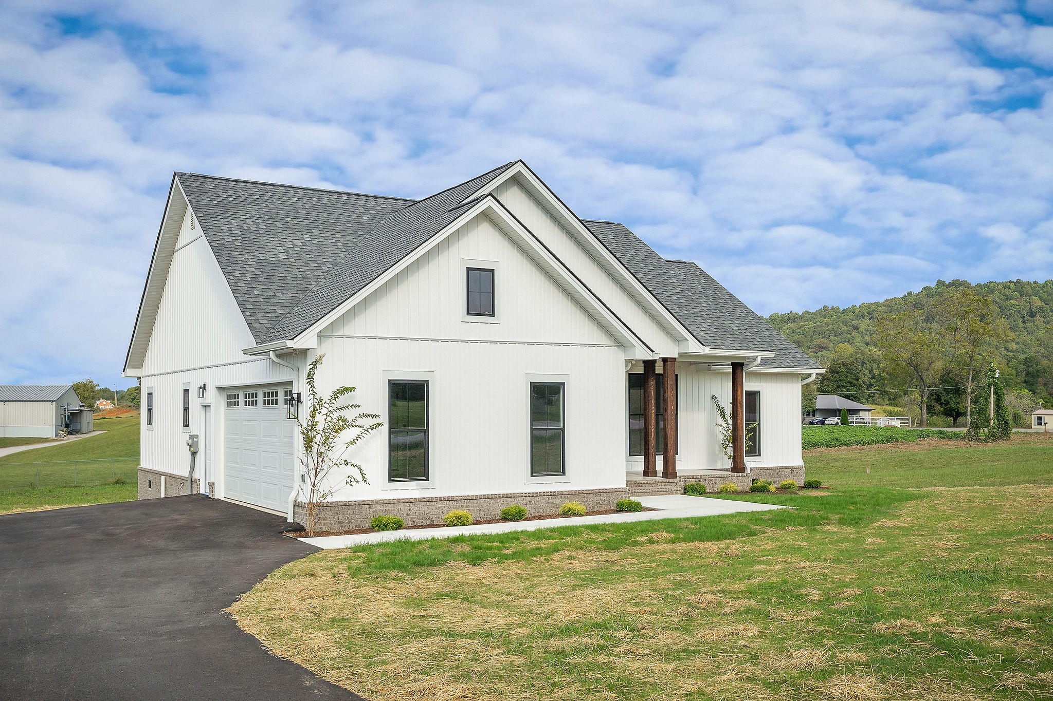 217 Oaklawn Cemetery Road Sparta, TN 38583 - Photo 3 of 42 a view of a house with a backyard