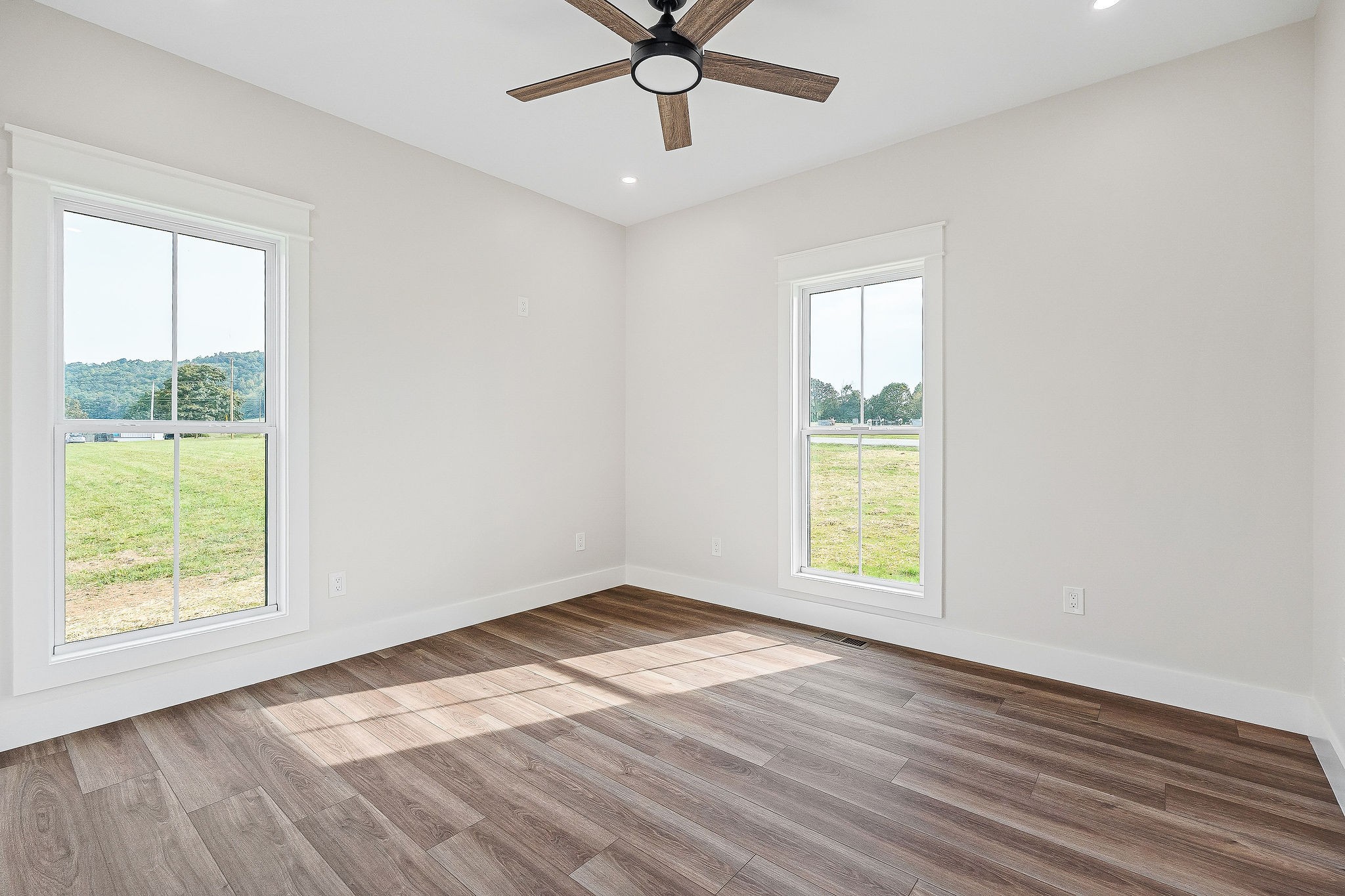 217 Oaklawn Cemetery Road Sparta, TN 38583 - Photo 31 of 42 wooden floor in an empty room with a window