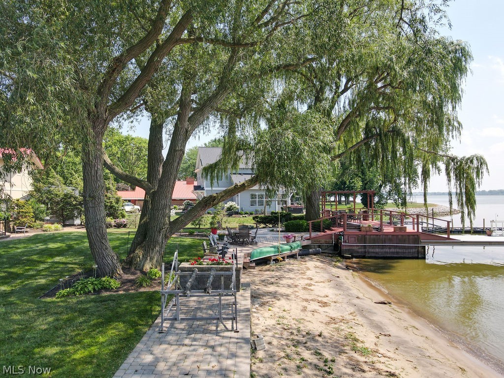 1431 Cedar Point Road Sandusky, OH 44870 - Photo 42 of 50 Dock featuring a water view and a yard