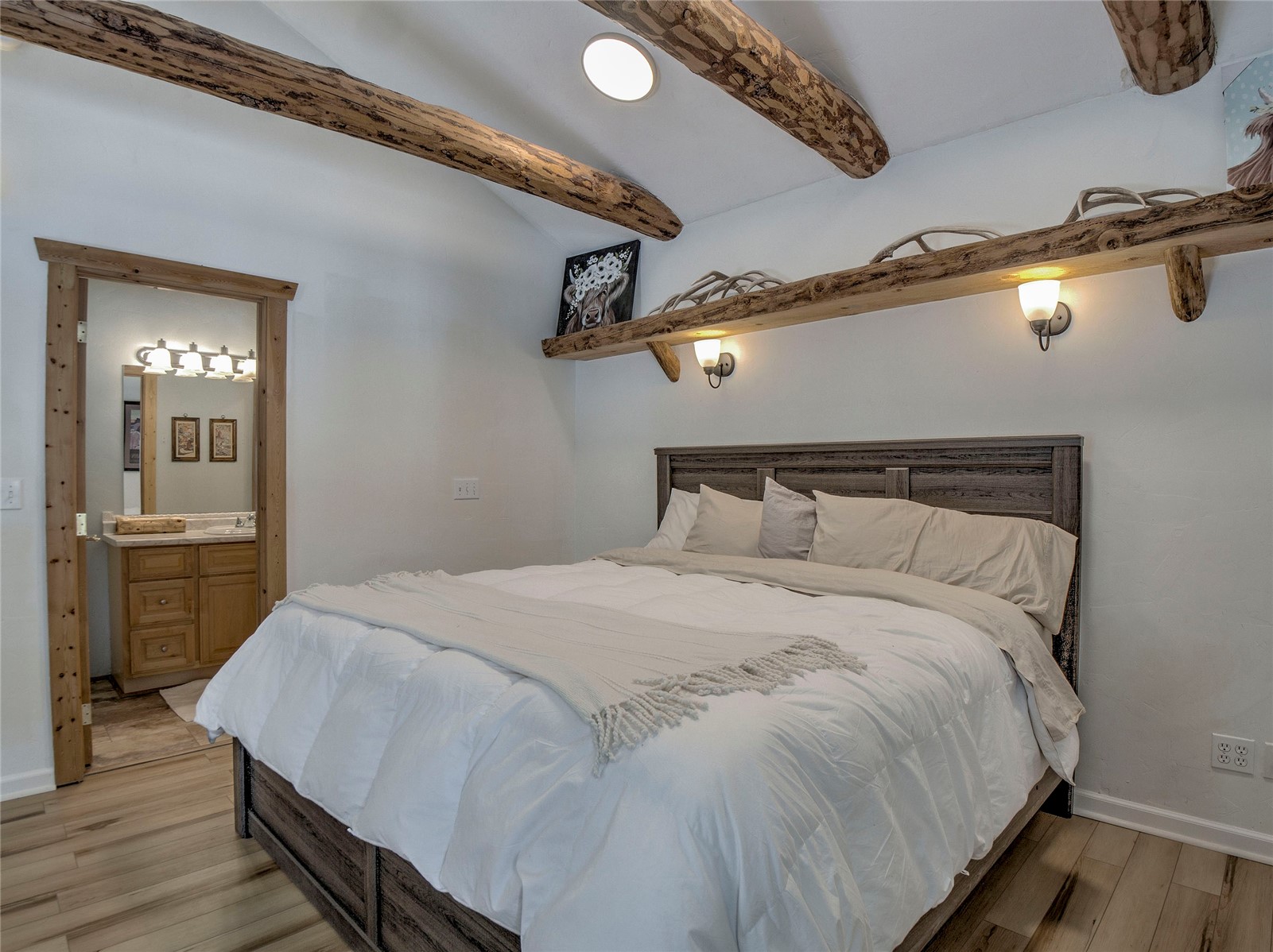 46 Singleton Road Alma, CO 80420 - Photo 5 of 50 a bedroom with a bed and wooden floor