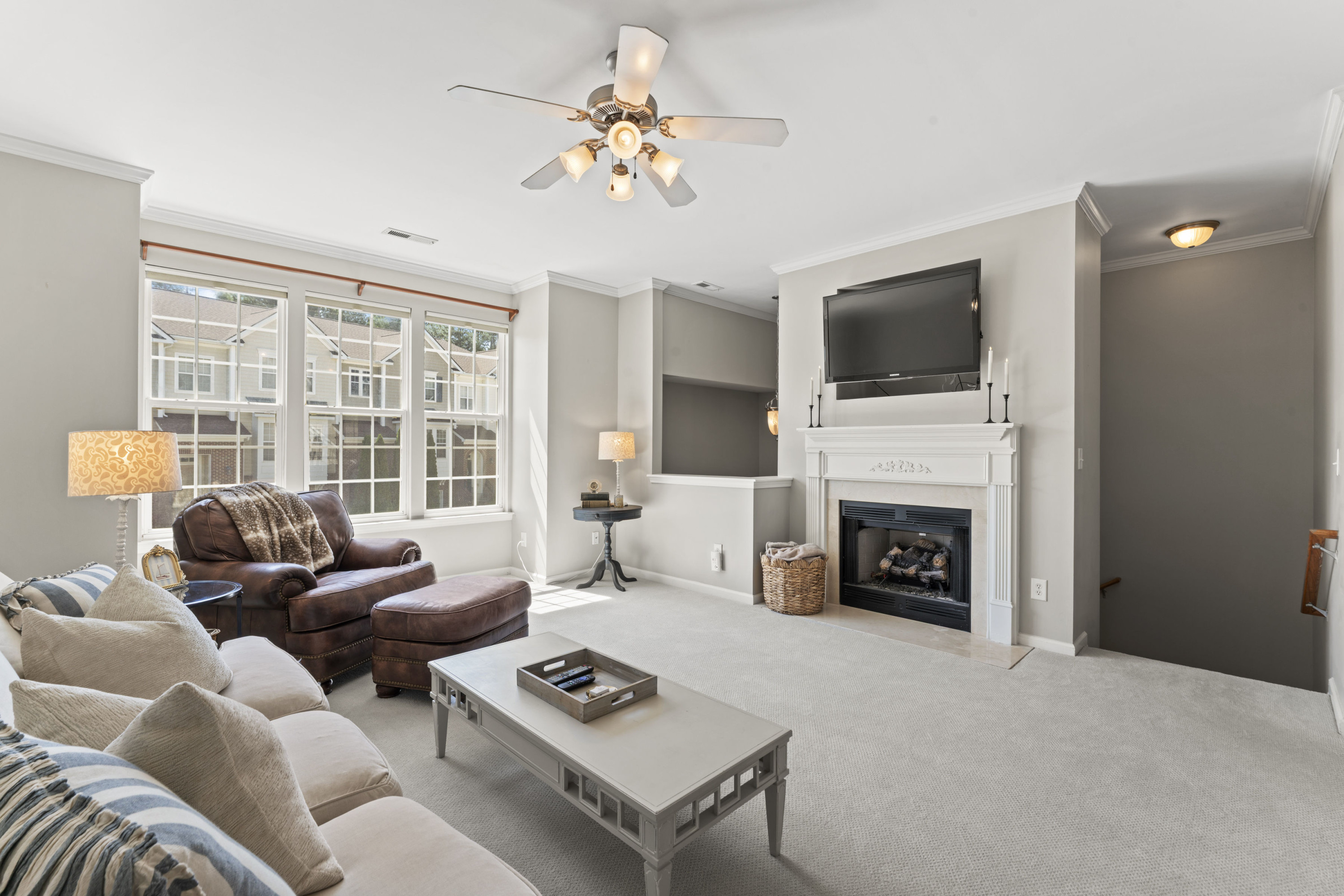 5414 Silver Moon Lane Raleigh, NC 27606 - Photo 11 of 46 Living room w/fireplace