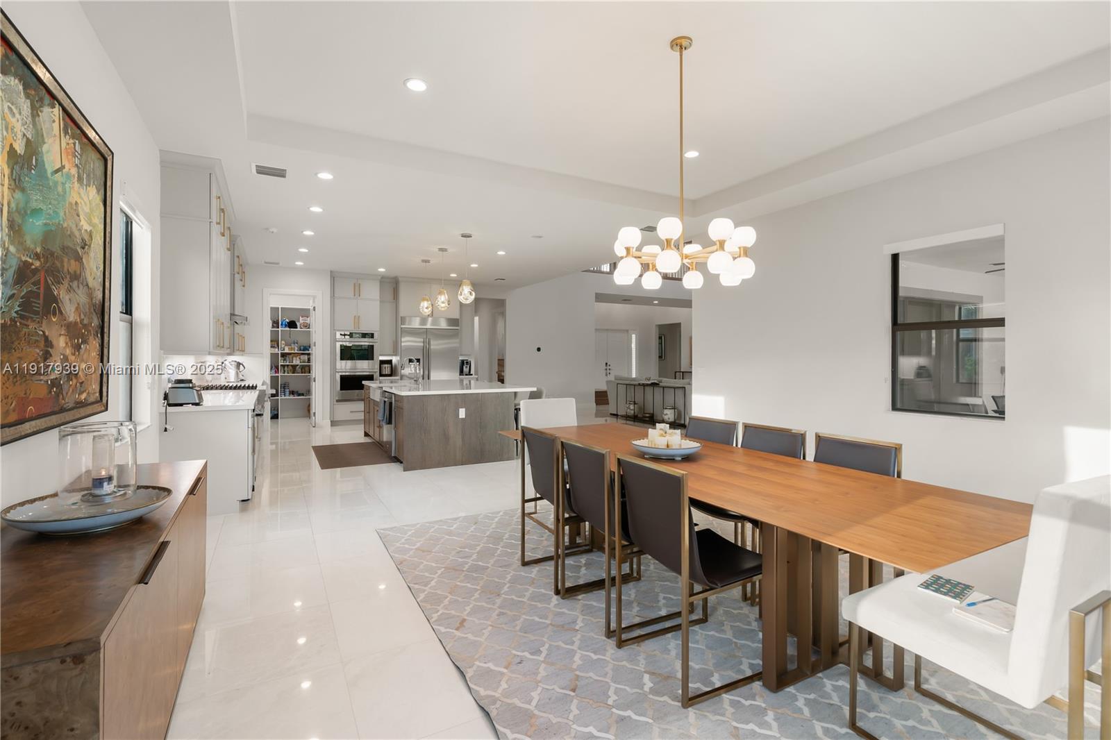14820 Millstone Ranches Drive Davie, FL 33331 - Photo 13 of 60 a view of a dining room with furniture and chandelier