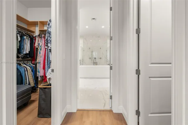 a bathroom with a bathtub and a sink