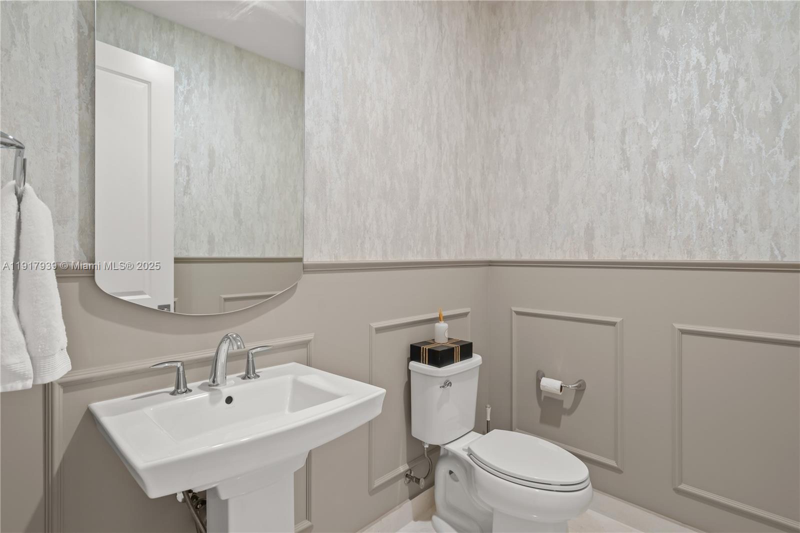 14820 Millstone Ranches Drive Davie, FL 33331 - Photo 21 of 60 a bathroom with a toilet a sink and mirror