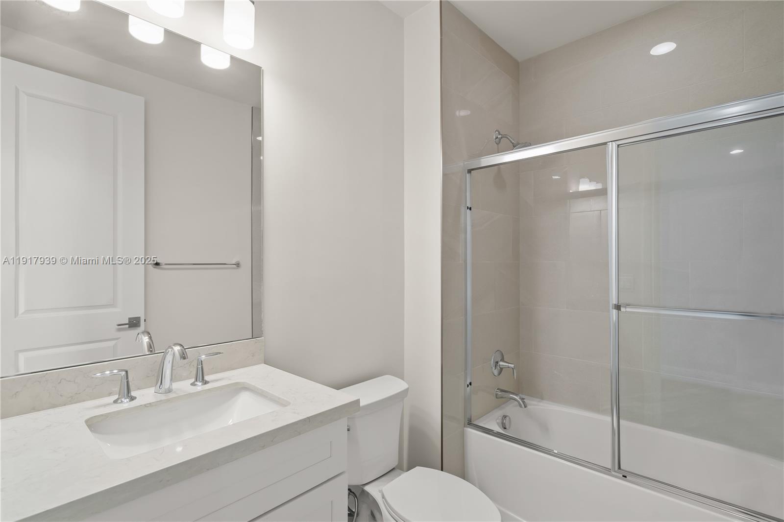 14820 Millstone Ranches Drive Davie, FL 33331 - Photo 23 of 60 a bathroom with a sink toilet and shower