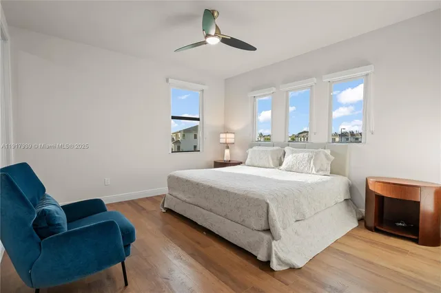 a view of a hallway with seating area