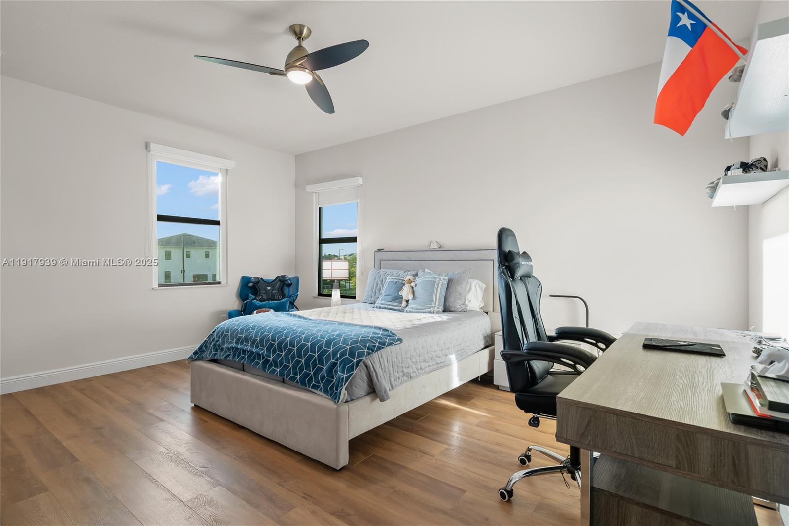 14820 Millstone Ranches Drive Davie, FL 33331 - Photo 30 of 60 a bedroom with a bed and wooden floor