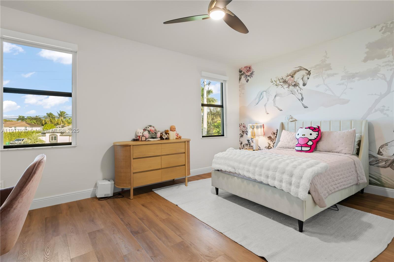 14820 Millstone Ranches Drive Davie, FL 33331 - Photo 32 of 60 a bedroom with a bed and a window