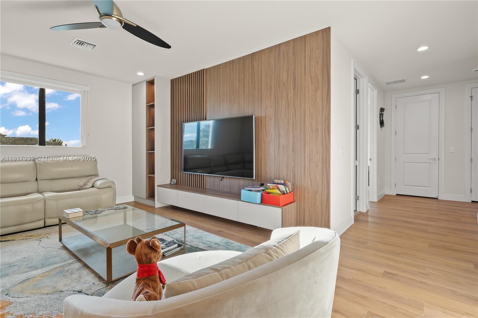 14820 Millstone Ranches Drive Davie, FL 33331 - Photo 34 of 60 a living room with furniture and a flat screen tv