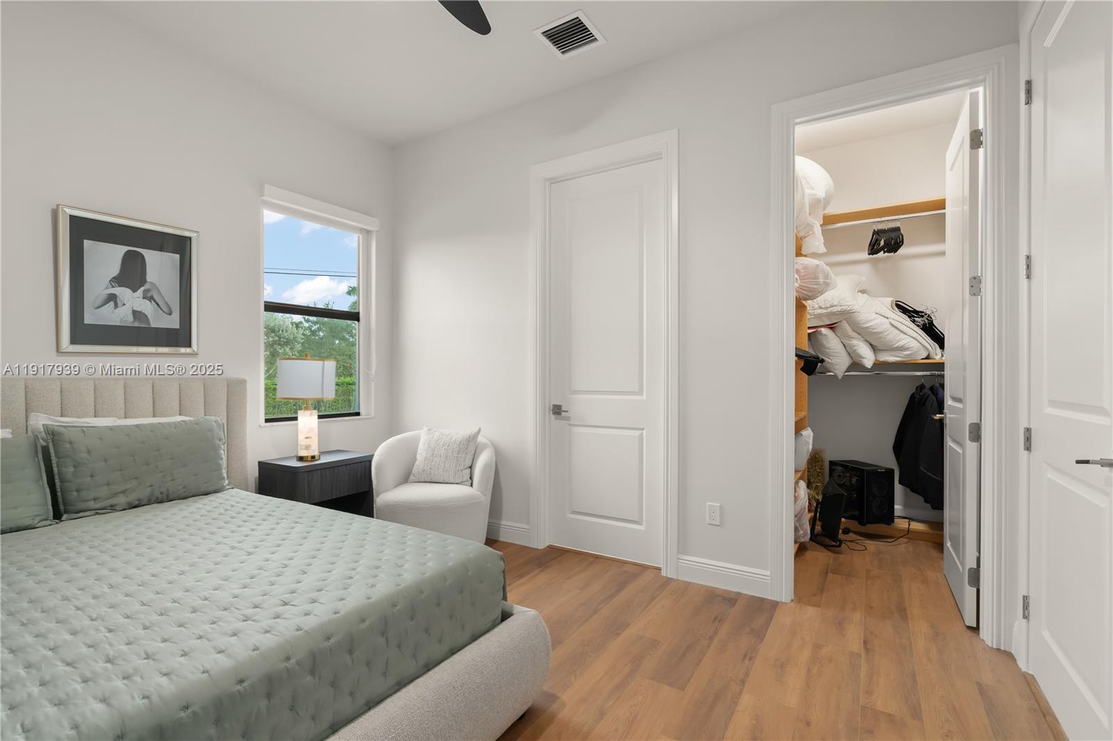 14820 Millstone Ranches Drive Davie, FL 33331 - Photo 37 of 60 a bedroom with a bed and a window