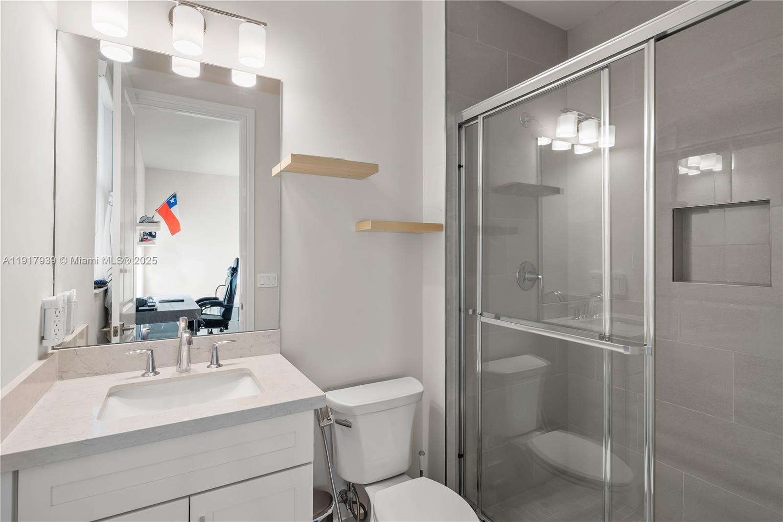 14820 Millstone Ranches Drive Davie, FL 33331 - Photo 38 of 60 a bathroom with a sink toilet and shower