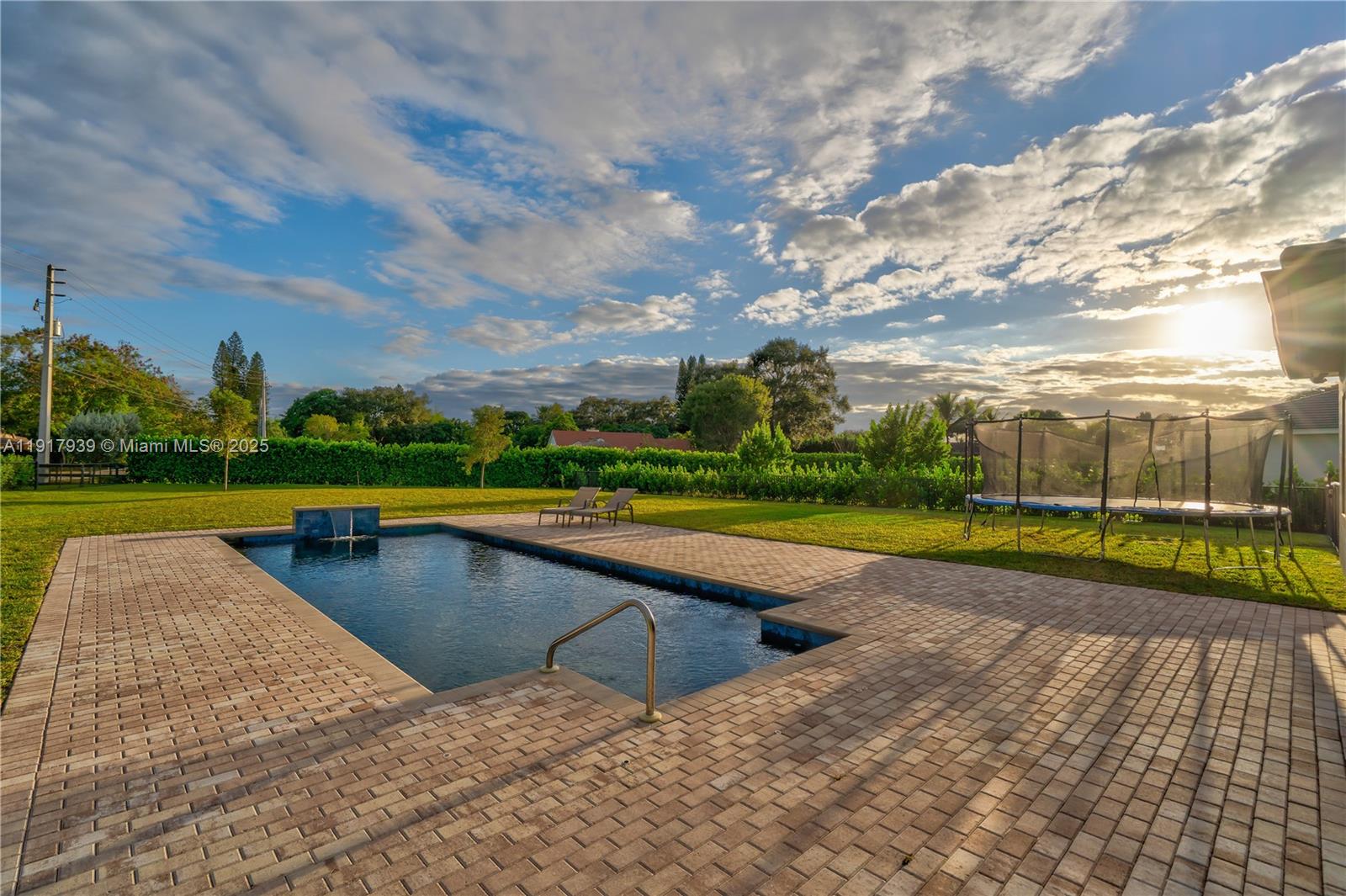 14820 Millstone Ranches Drive Davie, FL 33331 - Photo 45 of 60 a view of swimming pool is middle in the garden
