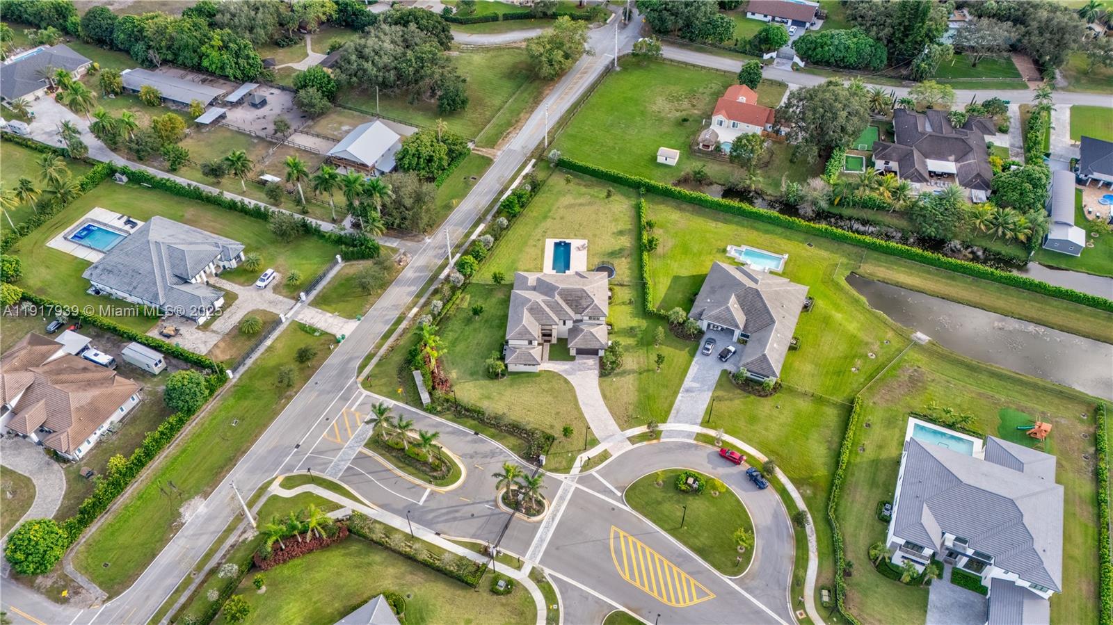 14820 Millstone Ranches Drive Davie, FL 33331 - Photo 59 of 60 an aerial view of swimming pool patio and outdoor seating