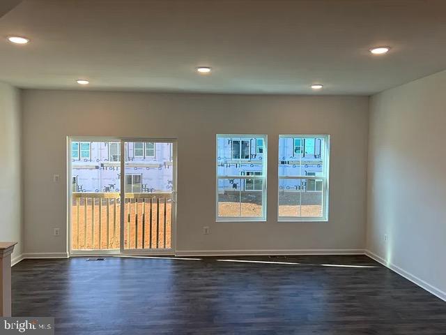 361 Truth Way Martinsburg, WV 25405 - Photo 12 of 17 a view of an empty room with wooden floor and a window