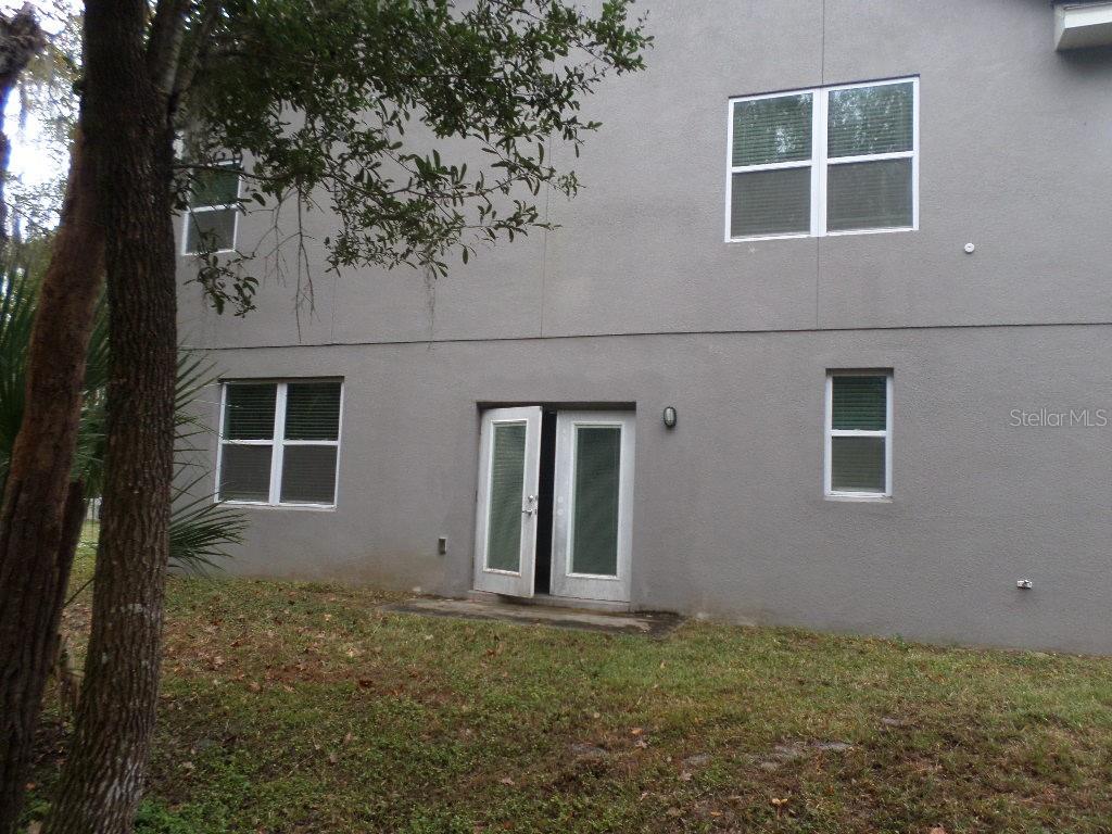 2773 Red Wing Village DeLand, FL 32720 - Photo 2 of 16 front view of a house with a yard