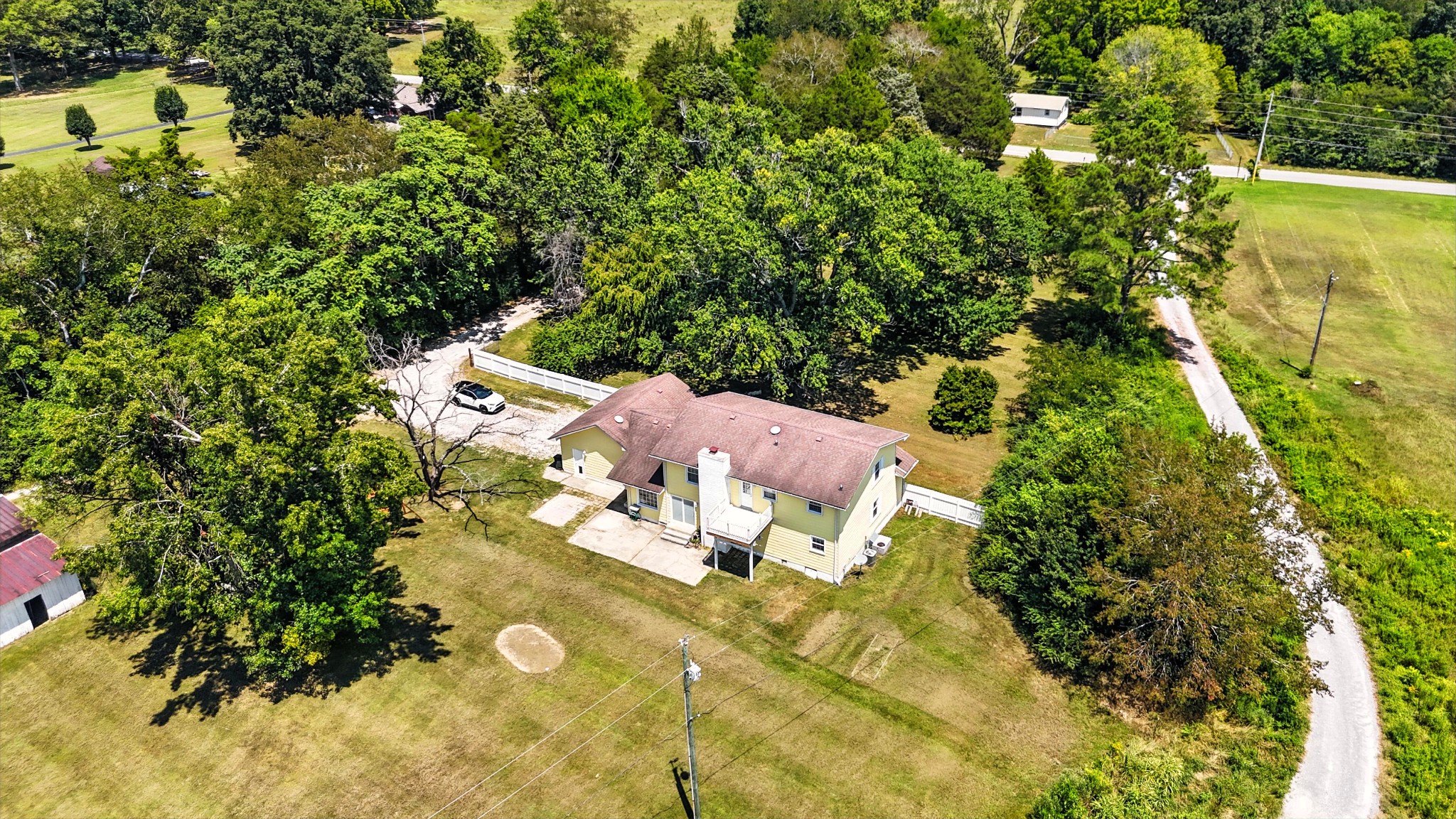 1840 Lockmiller Road Estill Springs, TN 37330 - Photo 12 of 71 a view of a house with a yard and sitting area