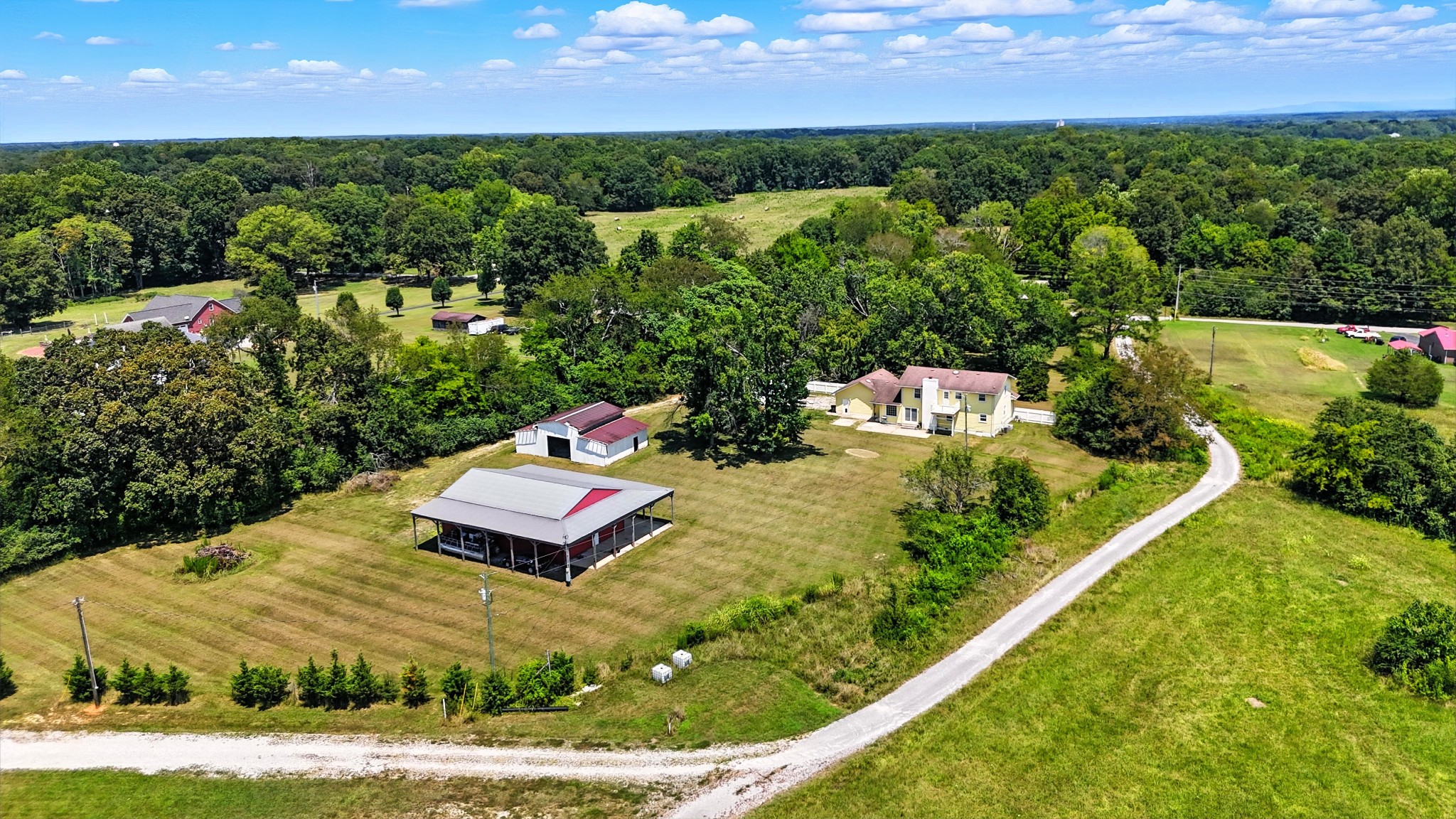 1840 Lockmiller Road Estill Springs, TN 37330 - Photo 14 of 71 an aerial view of a house with a garden and lake view