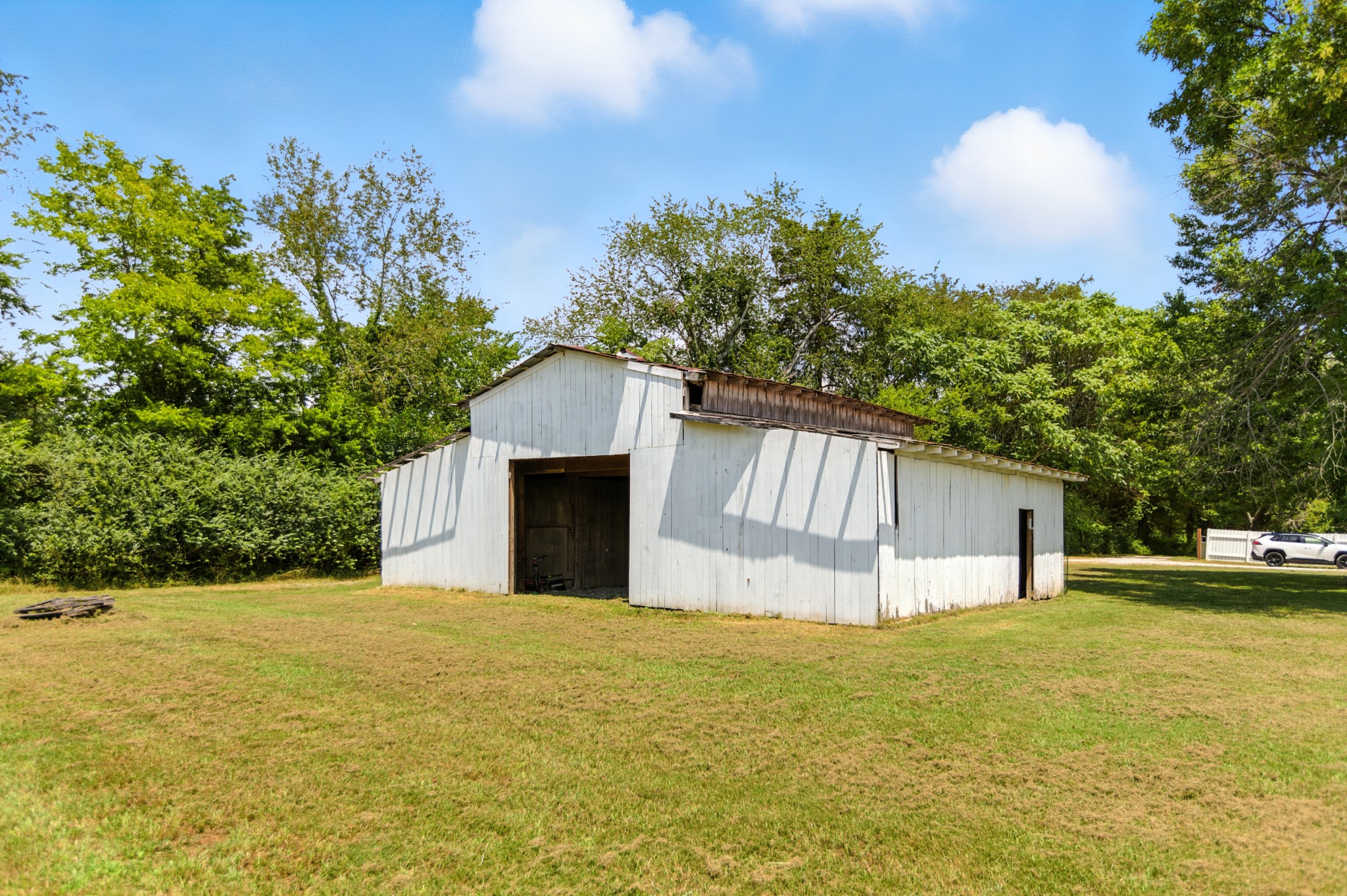 1840 Lockmiller Road Estill Springs, TN 37330 - Photo 15 of 71 a view of a house with a yard and garage