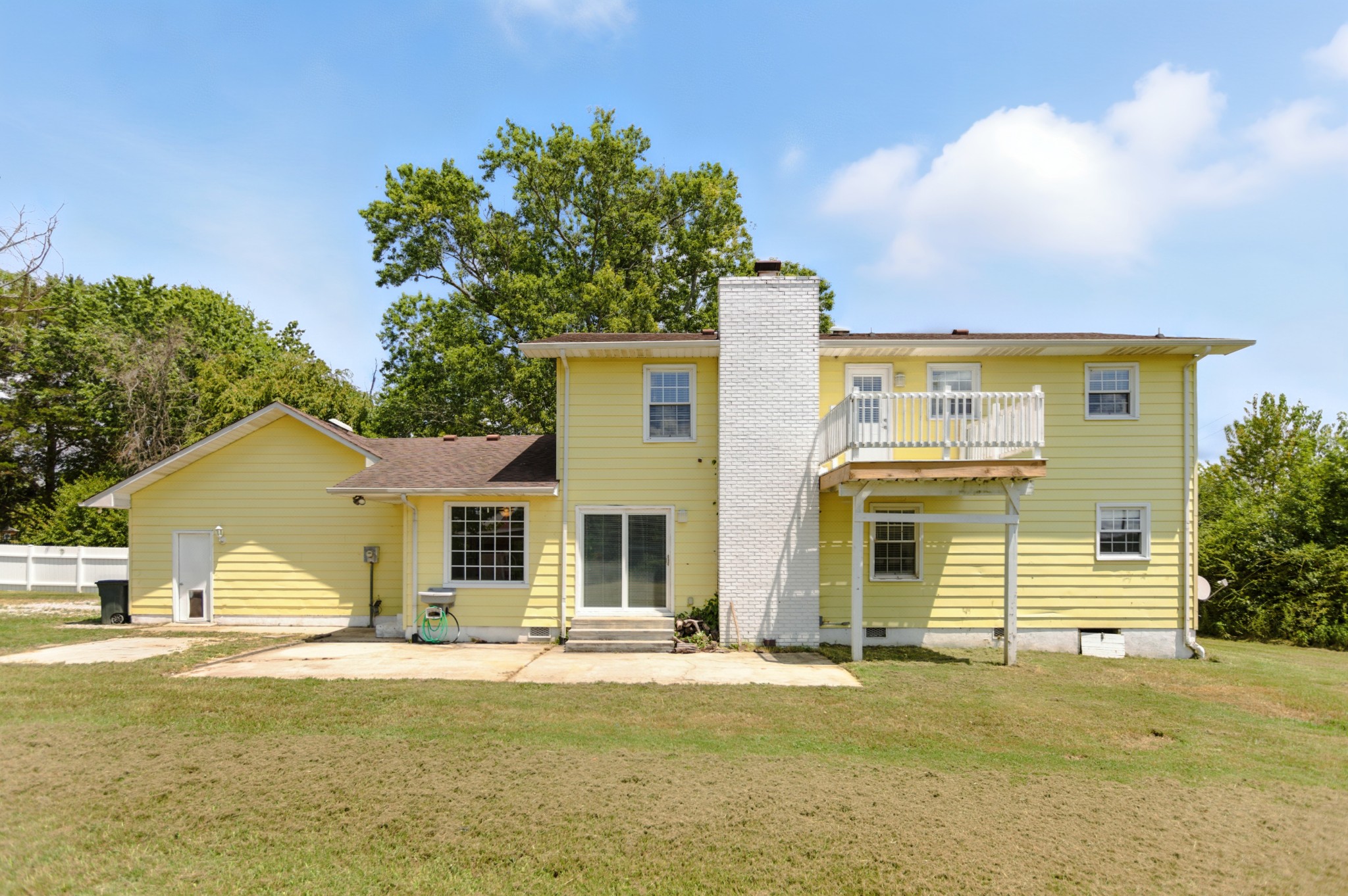 1840 Lockmiller Road Estill Springs, TN 37330 - Photo 21 of 71 a front view of a house with a garden and yard